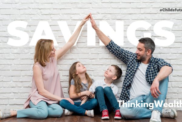 Parents with two children holding hands above their kids_ Savings for childs future_ThinkingWealth